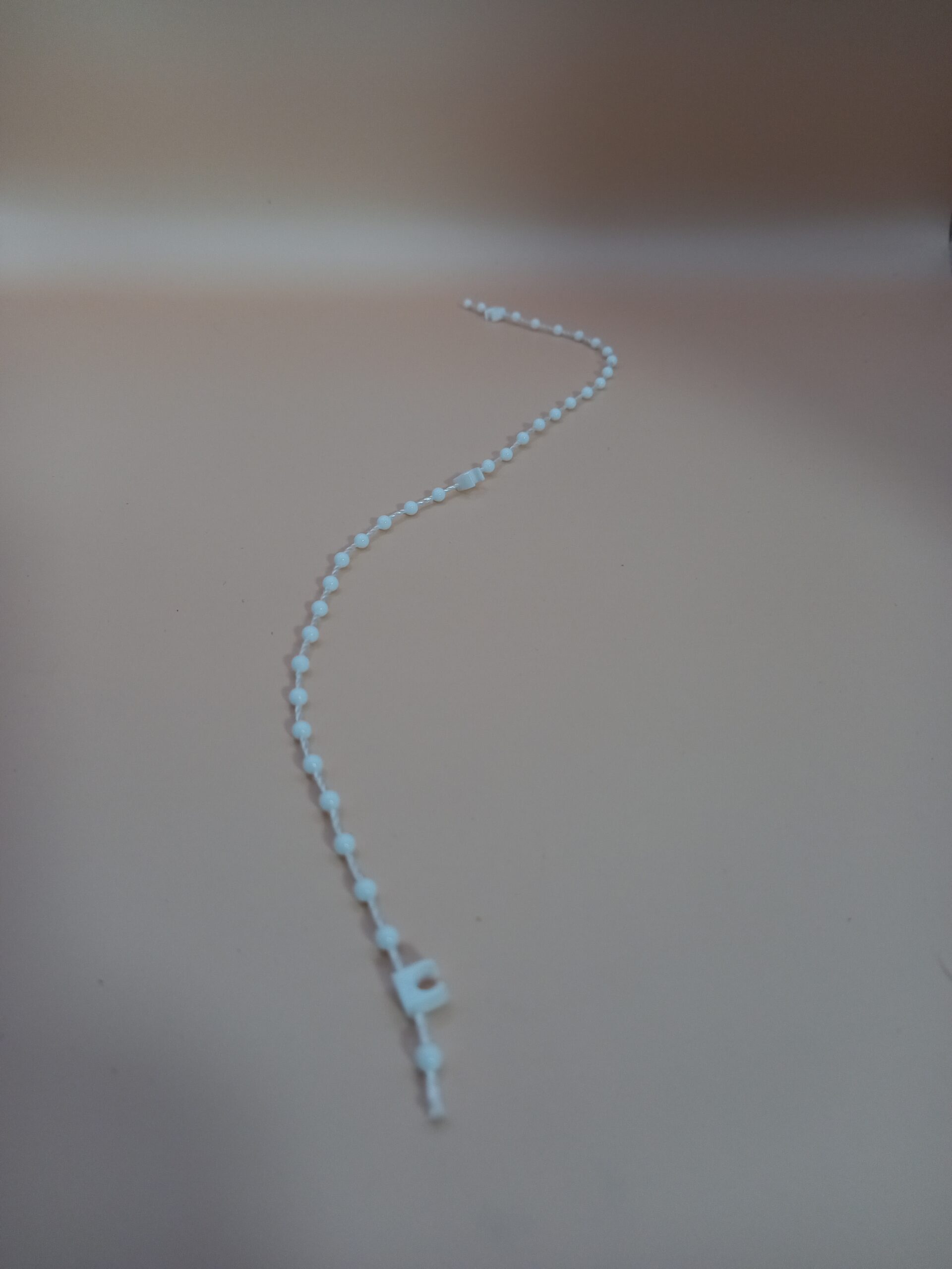 szalagfüggöny alsó összekötő gyöngysor redőny áruház